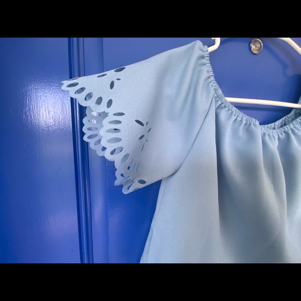 Beautiful light blue top paired nicely with jeans